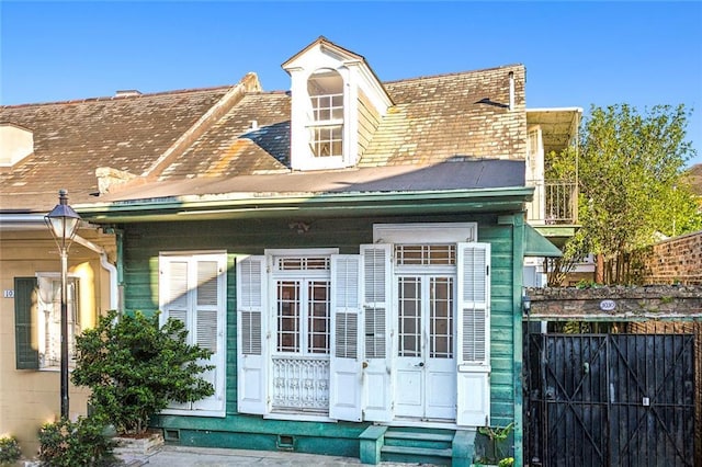 view of side of property with fence