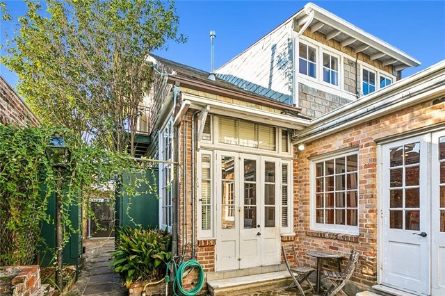 view of outdoor structure with french doors