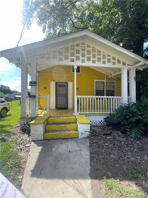 view of front of home featuring covered porch