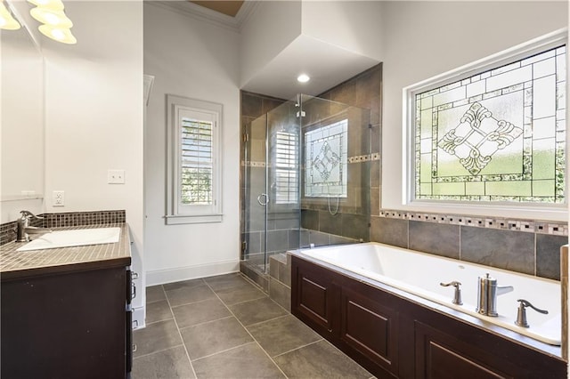 bathroom featuring vanity, ornamental molding, tile patterned floors, and independent shower and bath