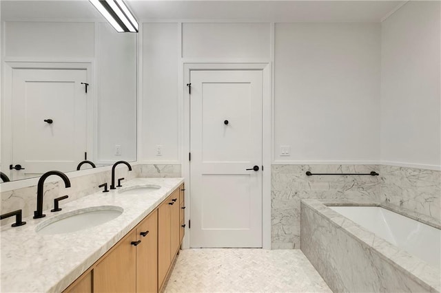 bathroom with a bath and vanity