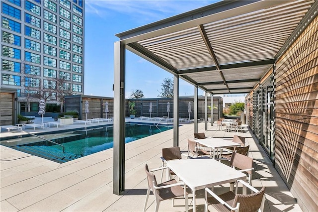 view of pool featuring a patio area