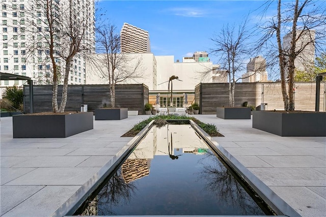 view of swimming pool with outdoor lounge area and a patio area