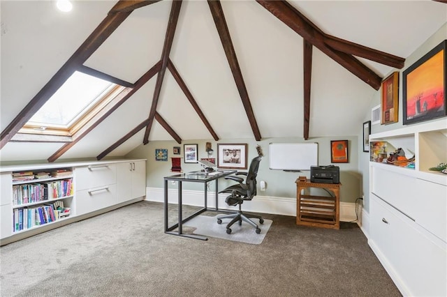 home office with carpet flooring and vaulted ceiling with skylight