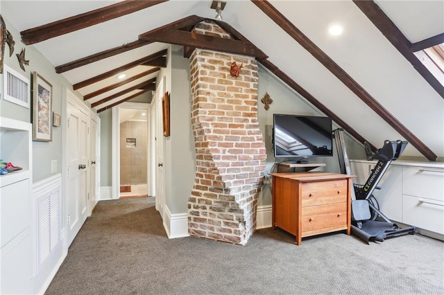 interior space featuring vaulted ceiling with beams and dark carpet