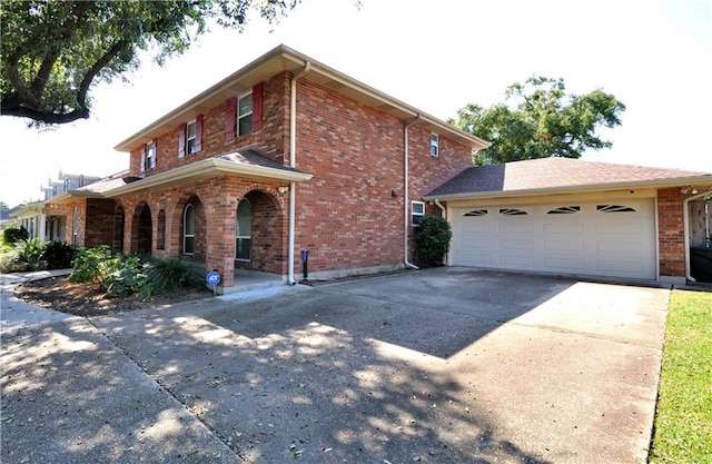 view of front of property with a garage