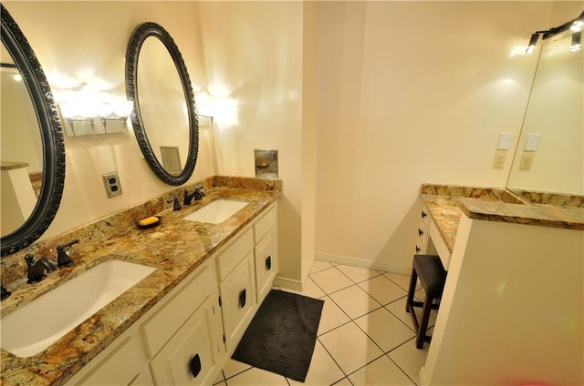 bathroom featuring tile patterned floors and vanity