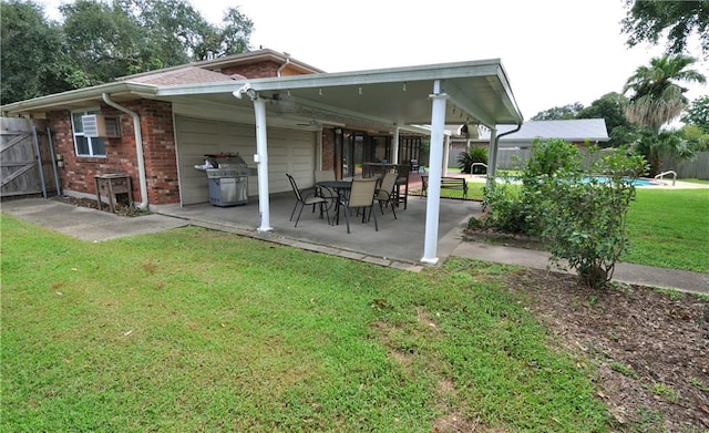 exterior space with a lawn and a patio area