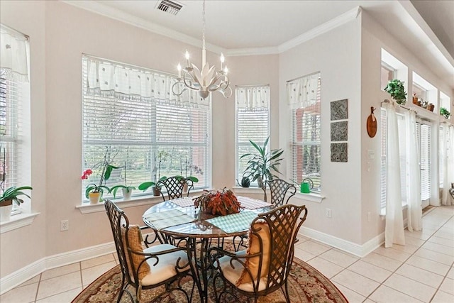 dining space with ornamental molding, light tile patterned floors, and a notable chandelier