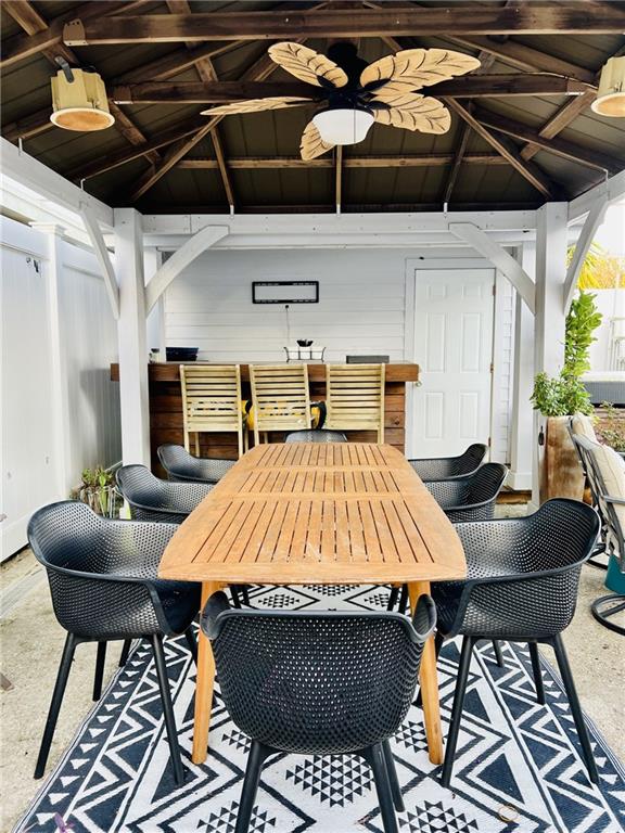 view of patio / terrace with a gazebo and ceiling fan