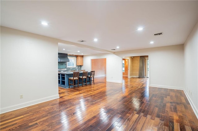 living room featuring dark hardwood / wood-style flooring