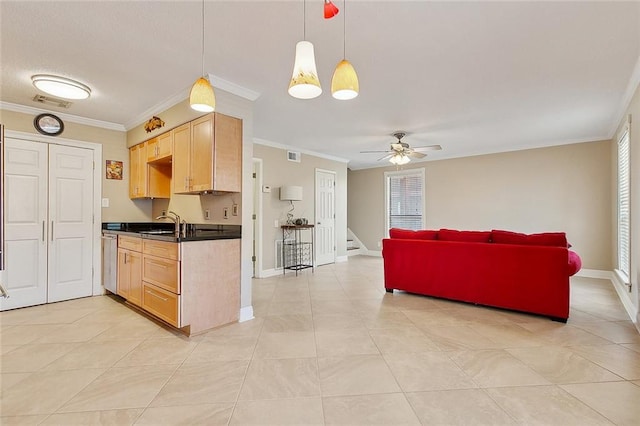 kitchen featuring light brown cabinetry, stainless steel dishwasher, ceiling fan, crown molding, and pendant lighting