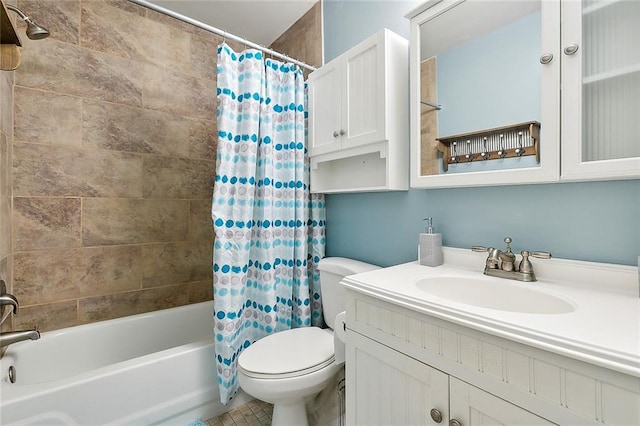 full bathroom featuring shower / bath combo with shower curtain, vanity, and toilet