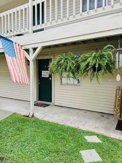 doorway to property with a balcony