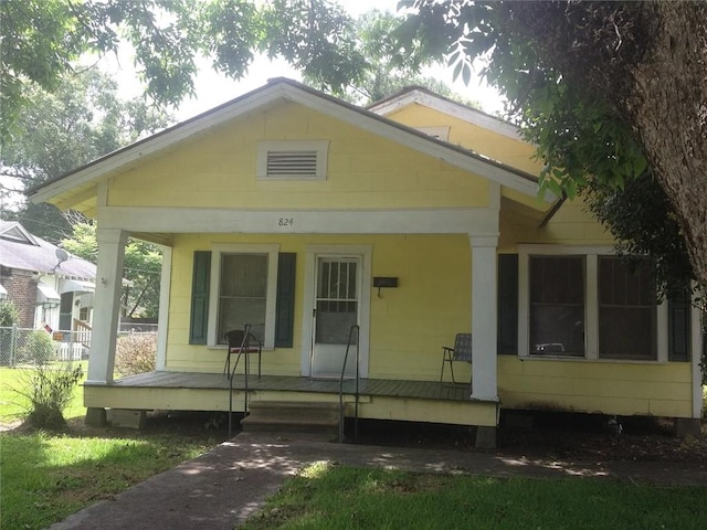 bungalow-style home with a porch