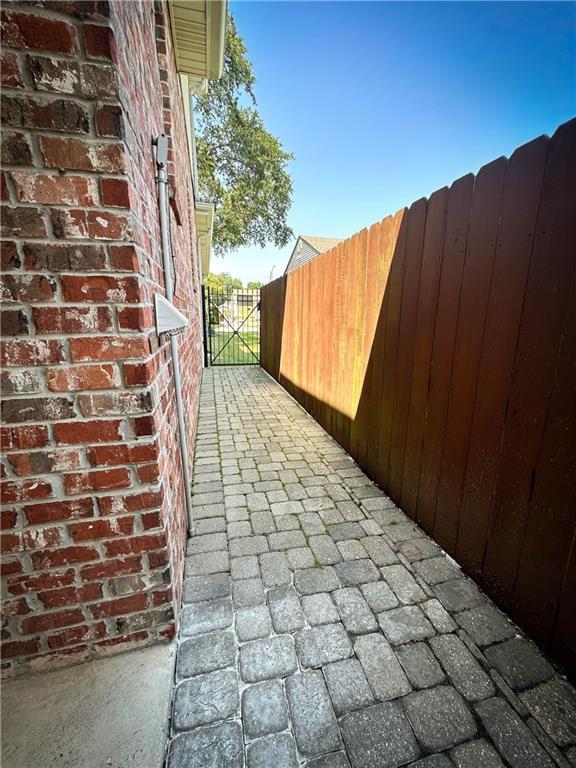 6613 Memphis St, New Orleans, LA 70124 - view of patio with fence