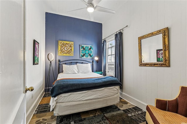 bedroom featuring wood-type flooring and ceiling fan