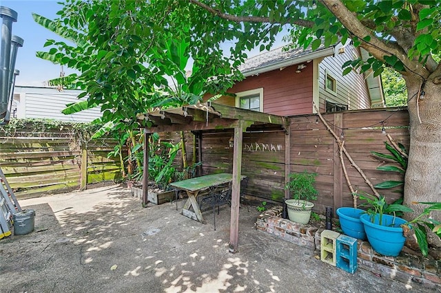 view of patio with fence