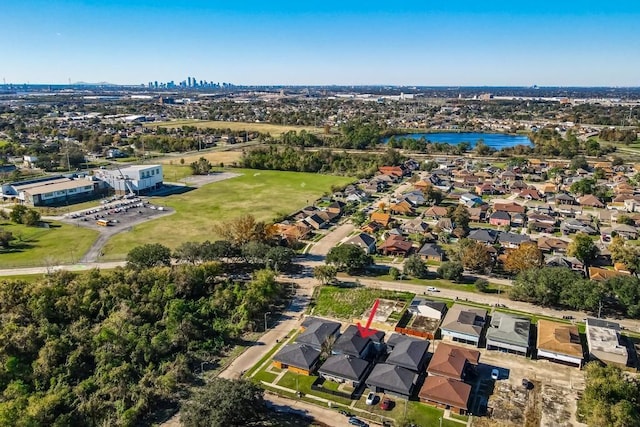 birds eye view of property featuring a water view