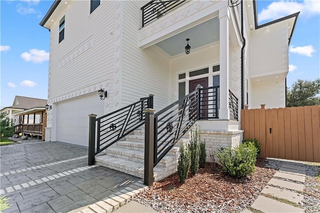 entrance to property featuring a garage