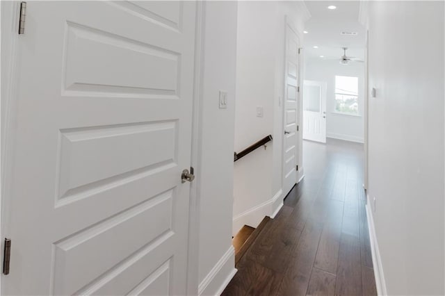 hall with dark hardwood / wood-style flooring