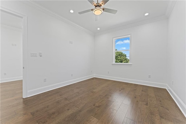 spare room with ornamental molding, dark hardwood / wood-style flooring, and ceiling fan