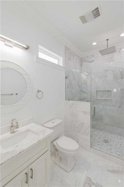 bathroom with walk in shower, vanity, and toilet