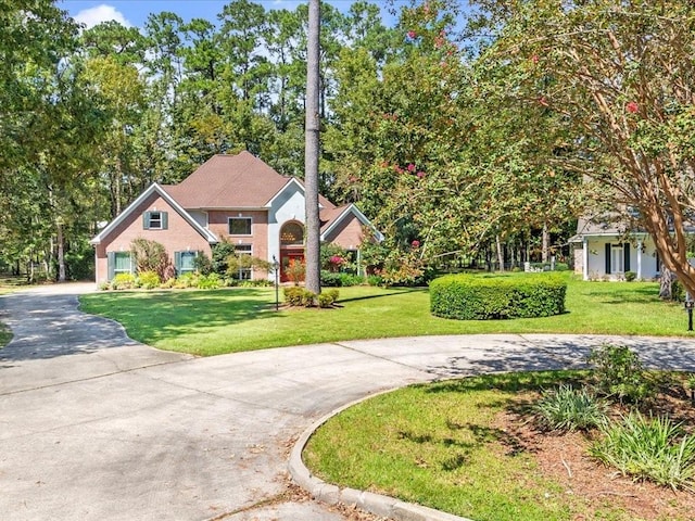 view of front of property with a front lawn