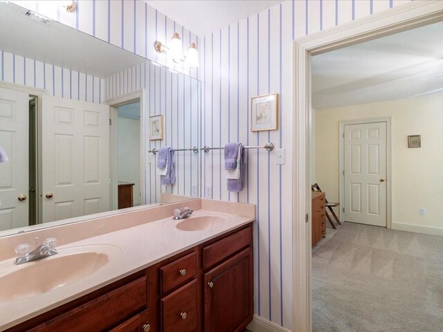 bathroom featuring vanity, ornamental molding, and separate shower and tub