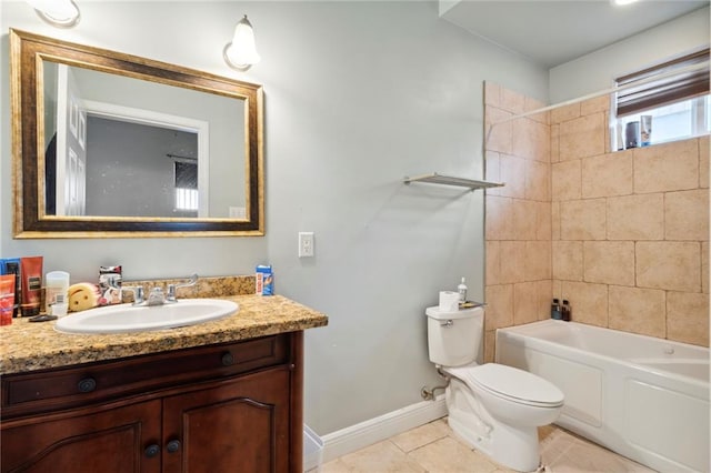 full bathroom with vanity, tiled shower / bath combo, toilet, and tile patterned floors