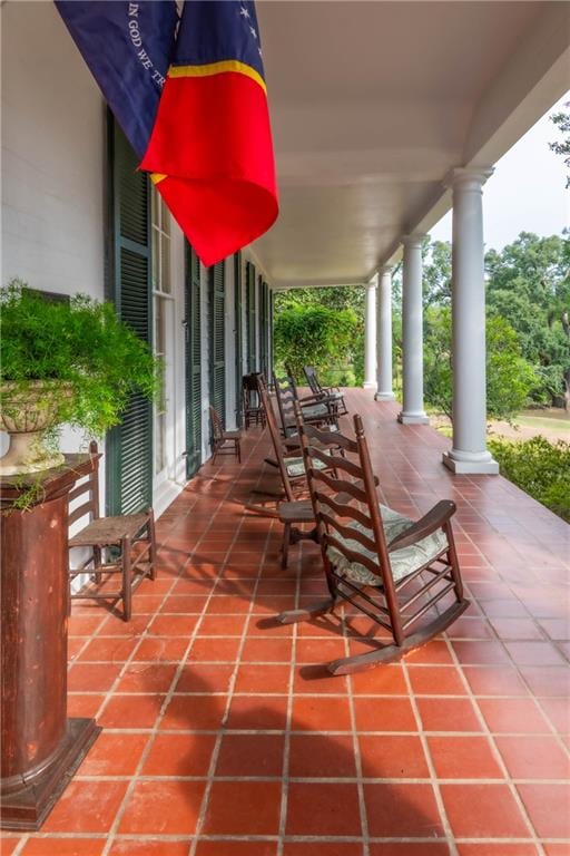 view of patio featuring a porch