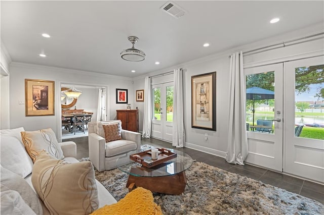 living room featuring french doors, recessed lighting, visible vents, and crown molding