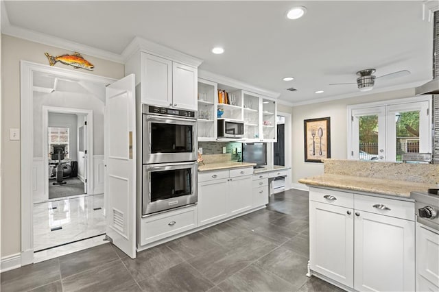 kitchen with white cabinets, stainless steel appliances, crown molding, open shelves, and recessed lighting