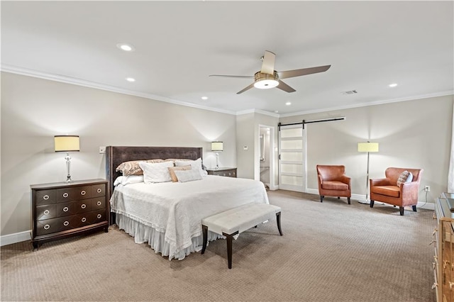 carpeted bedroom featuring a barn door, recessed lighting, visible vents, baseboards, and ornamental molding