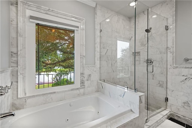 full bathroom with a jetted tub and a marble finish shower