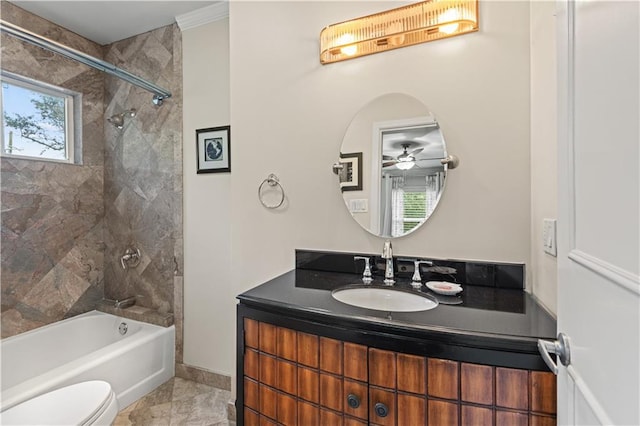 bathroom with marble finish floor, bathing tub / shower combination, toilet, vanity, and baseboards