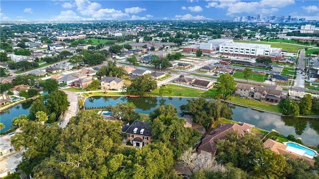 bird's eye view with a water view and a residential view