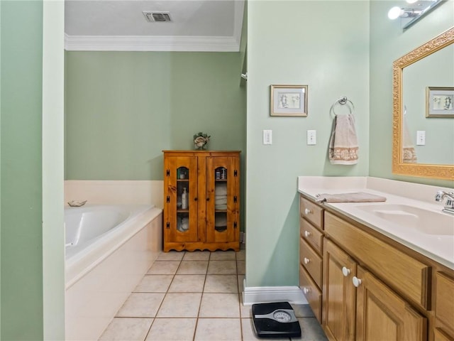 bathroom with ornamental molding, tile patterned floors, tiled tub, and vanity