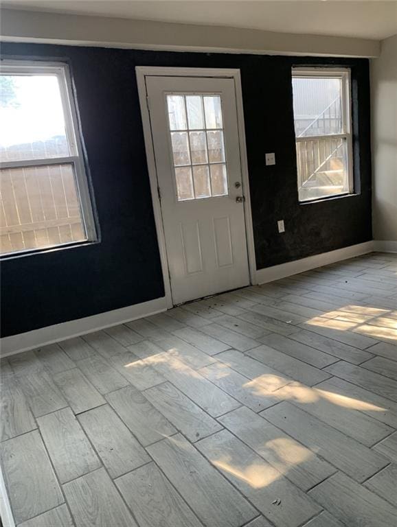 entrance foyer featuring light hardwood / wood-style floors