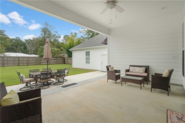 view of patio / terrace with ceiling fan and outdoor lounge area