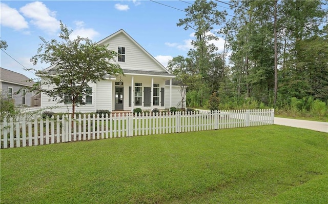 view of front facade with covered porch and a front yard