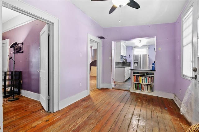 interior space featuring ceiling fan and light hardwood / wood-style flooring