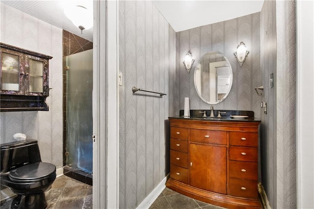 bathroom featuring vanity, toilet, and tile patterned floors