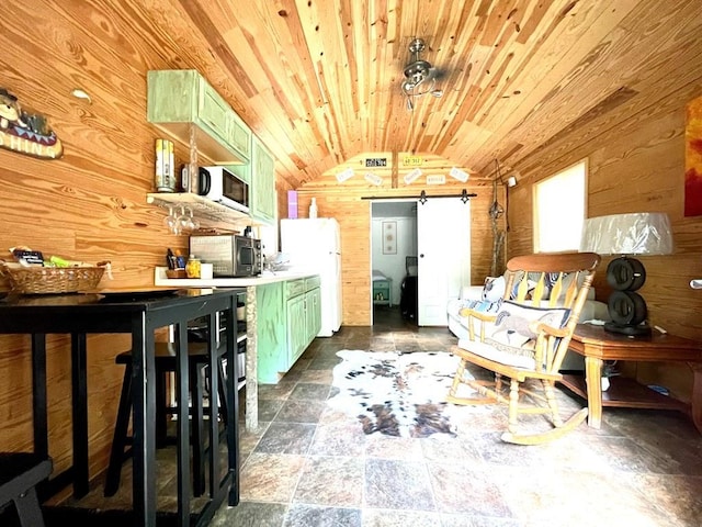 interior space with wood ceiling, white appliances, green cabinetry, wooden walls, and vaulted ceiling