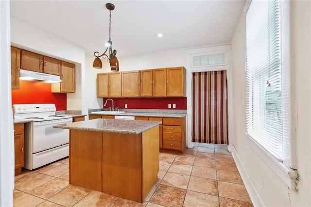 kitchen featuring a kitchen island, white electric stove, decorative light fixtures, sink, and a notable chandelier