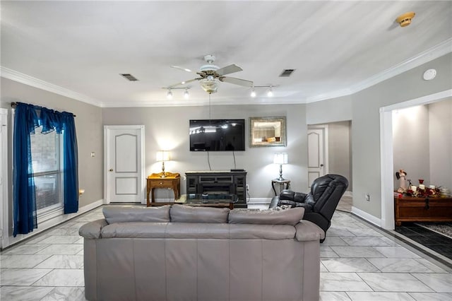 living room featuring ceiling fan and crown molding