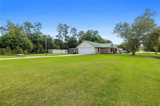 view of yard featuring a garage