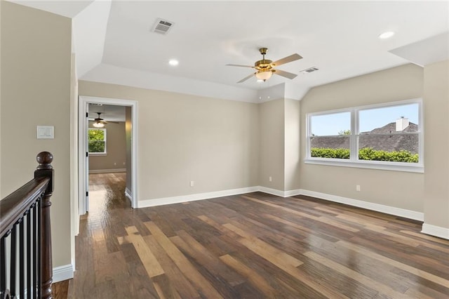 spare room featuring ceiling fan and dark hardwood / wood-style flooring