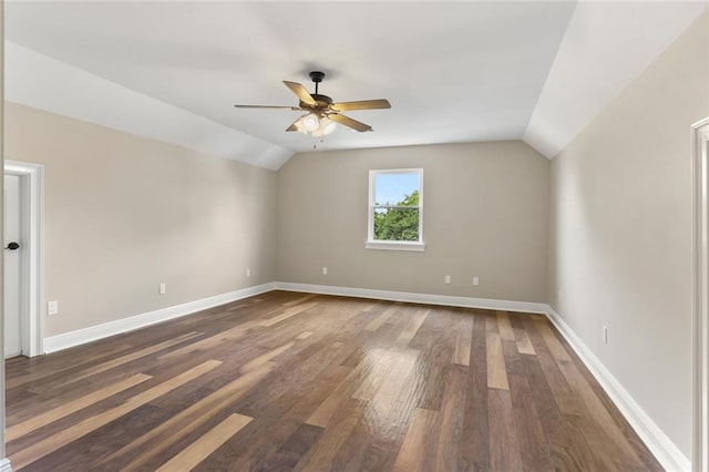 bonus room featuring ceiling fan, lofted ceiling, and dark wood-type flooring