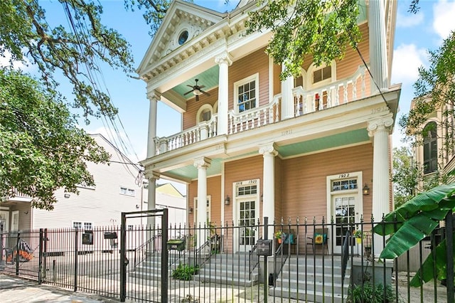 greek revival house with a balcony